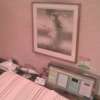 マリオネットアイネ(八王子市/ラブホテル)の写真『210号室、枕元のコントロールパネルと電マなど』by もんが～