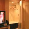 HOTEL DINO 相模原(ディーノ)(相模原市/ラブホテル)の写真『315号室、クローゼットと電子レンジ』by もんが～