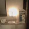 フランセ(八王子市/ラブホテル)の写真『909号室、枕元の電話と販売機など』by もんが～
