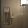 フランセ(八王子市/ラブホテル)の写真『909号室、入り口ドアを入って、部屋（畳のある所）に向かう廊下にあるエアシューターと電話』by もんが～
