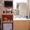 エレガンスイン(大阪市/ラブホテル)の写真『301号室 洗面台、テレビ、備品類』by マーケンワン