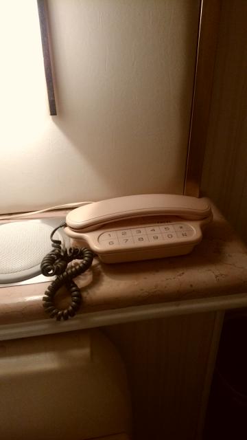 HOTEL Sun（サン）(新宿区/ラブホテル)の写真『606号室の室内電話』by 名無しさん（ID:4403）