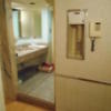 フランセ(八王子市/ラブホテル)の写真『512号室、エアシューター、電話と洗面所入り口』by もんが～