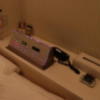 ホテル アップル(八王子市/ラブホテル)の写真『209号室枕元（コントロールパネル、電マ、インターフォン、ティッシュ、ゴム）』by 夕立朝立