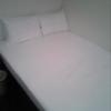 レンタルルームサン 五反田店(品川区/ラブホテル)の写真『209号室 ベッドは清潔性があり、広いです。枕は２つ。掛け布団やモーフはなし』by セイムス