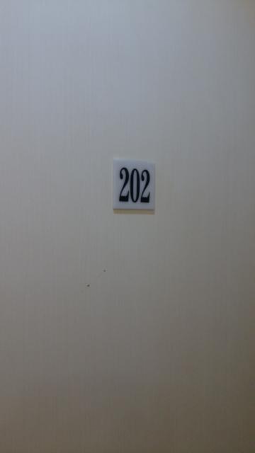 レンタルルーム コスモス(千代田区/ラブホテル)の写真『202号室　ドア』by 上戸 信二