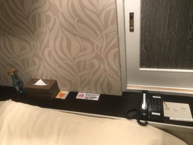 池袋パークサイドホテル(豊島区/ラブホテル)の写真『205号室 枕元』by 114114bandp