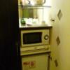 HOTEL AILU(アイル)(豊島区/ラブホテル)の写真『202号室（電子レンジ・自動販売機）』by 格付屋