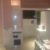 HOTEL GRASIA 1 PREMIUM RESORT(川口市/ラブホテル)の写真『201号室　ベッド奥からの部屋風景（左が部屋入口扉、右にソファーとテーブル、奥にドレッサーと備品類の収納家具スペース）』by YOSA69
