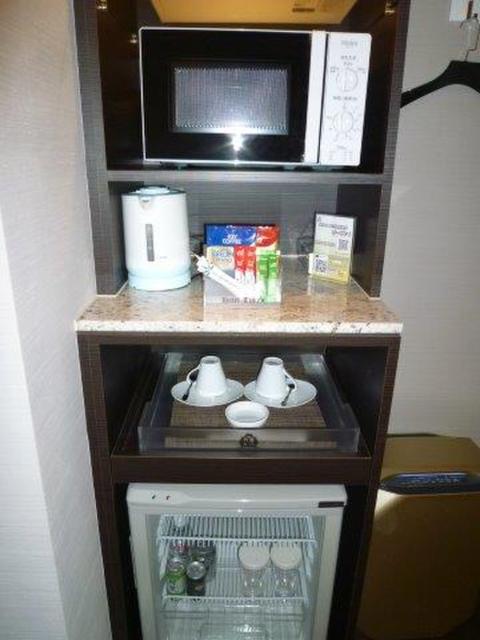 ホテル タイムズ(豊島区/ラブホテル)の写真『203号室（電子レンジ他）』by 格付屋