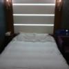ホテル ZERO Ⅱ’(渋谷区/ラブホテル)の写真『215号室ベッド 背面の照明が眩しいぐらい明るい』by angler