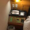 ホテル リンデン 湯島(文京区/ラブホテル)の写真『703号室 ベッド脇の電話』by hireidenton