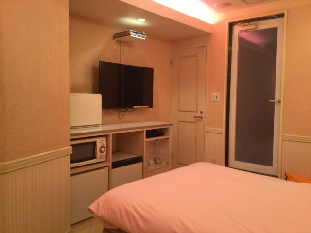 エルス(豊島区/ラブホテル)の写真『203号室 ソファから見た室内』by ACB48