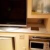 パセオ(新宿区/ラブホテル)の写真『310号室テレビ。右は茶器。下には持ち込み用冷蔵庫』by 春風拳