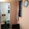 HOTEL LUPINUS（ルピナス）(大和市/ラブホテル)の写真『305号室、時計と部屋の奥です。(21,10)』by キジ