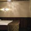 池袋グランドホテル(豊島区/ラブホテル)の写真『406号室 ソファから見た室内』by ACB48