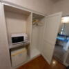ペリカン(渋谷区/ラブホテル)の写真『405号室 レンジ、冷蔵庫、クローゼット』by angler
