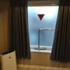 HOTEL P-DOOR（ホテルピードア）(台東区/ラブホテル)の写真『312号室 非常口と空気清浄機。』by なめろう
