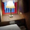 HOTEL Young Inn.(ヤング イン)(新宿区/ラブホテル)の写真『423号室　枕元の設備』by マーケンワン
