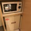 新宿ジャルディーノ(新宿区/ラブホテル)の写真『レンジとドリンク自販機』by 少佐