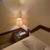 ホテル夕月 本館(さいたま市大宮区/ラブホテル)の写真『（206号室）ベッド横のライトなど』by こーめー