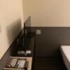 HOTEL グランフォート(新宿区/ラブホテル)の写真『202号室に入って左をむくとテレビがあります。テレビ棚の下には靴をしまいます。』by ゆうじい