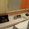 FASHION 2001 HOTEL(横浜市南区/ラブホテル)の写真『501号室 ベッド頭上に電マ、照明類のスイッチ、電話、ティッシュとコンドーム』by なめろう