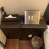 ホテル ピュア・アジアン(墨田区/ラブホテル)の写真『401号室　ベッド左の照明操作盤など』by 東京都