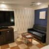 ホテル リンデン 湯島(文京区/ラブホテル)の写真『607号室　テレビとソファ　ベッド側から』by トマトなす