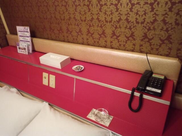 ホテル 富貴(大阪市/ラブホテル)の写真『201号室　ベッドヘッド』by タンスにゴンゴン