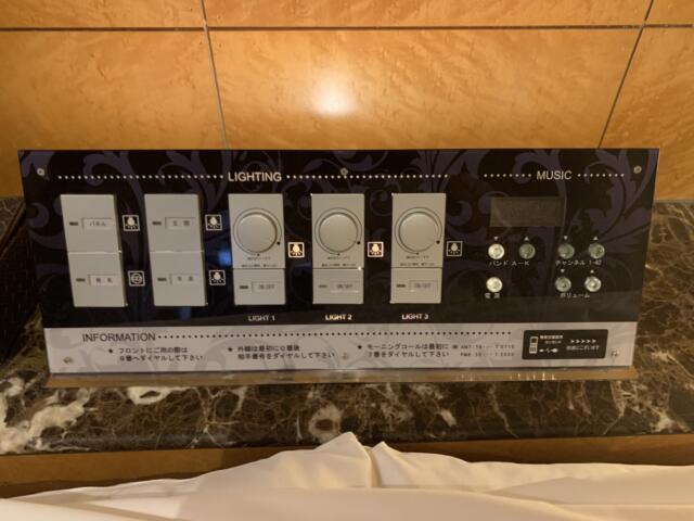ホテルen(エン)(豊島区/ラブホテル)の写真『502号室　ベッド上照明操作盤』by 東京都
