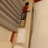 ホテル1987(新宿区/ラブホテル)の写真『401号室　枕元　電話　ゴム　ティッシュ　スタンド　調光ユニット』by angler