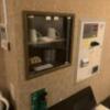 AKAIKUTSU(横浜市中区/ラブホテル)の写真『303号室　食器棚と自動精算機』by hireidenton