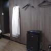 N HOTEL(千葉市中央区/ラブホテル)の写真『402号室　チェア位置より水まわり方向、空気清浄機』by マーケンワン