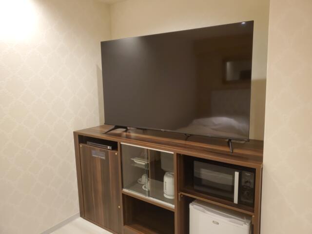 HOTEL GRANDE(川口市/ラブホテル)の写真『203号室　ベッド手前テレビ』by suisui