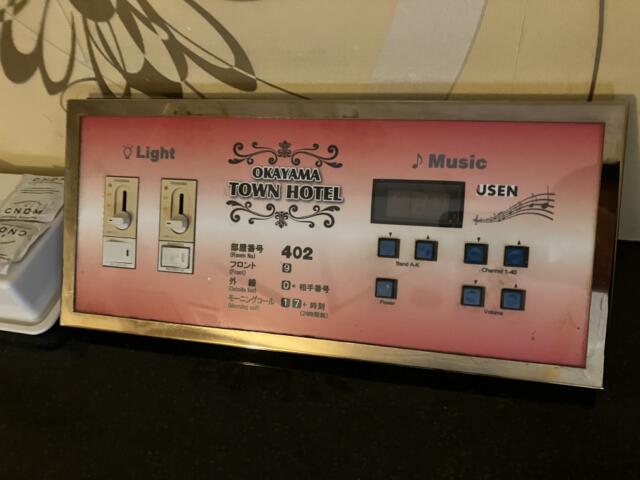 タウンホテル(岡山市/ラブホテル)の写真『402号室 ベッドサイドの操作パネル』by 92魔
