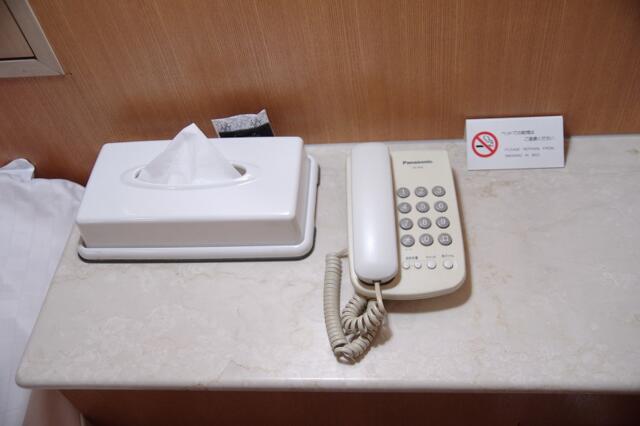 HOTEL SK PLAZA（エスケープラザ）(渋谷区/ラブホテル)の写真『402号室　枕元の設備類』by マーケンワン
