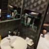 ホテル ユニオン(旭川市/ラブホテル)の写真『208号室 洗面台（鏡はライトをつけれるようになっている、ライトのON/OFFなどは中央の青いボタンをタッチすることで切り替え可能）』by t0m0